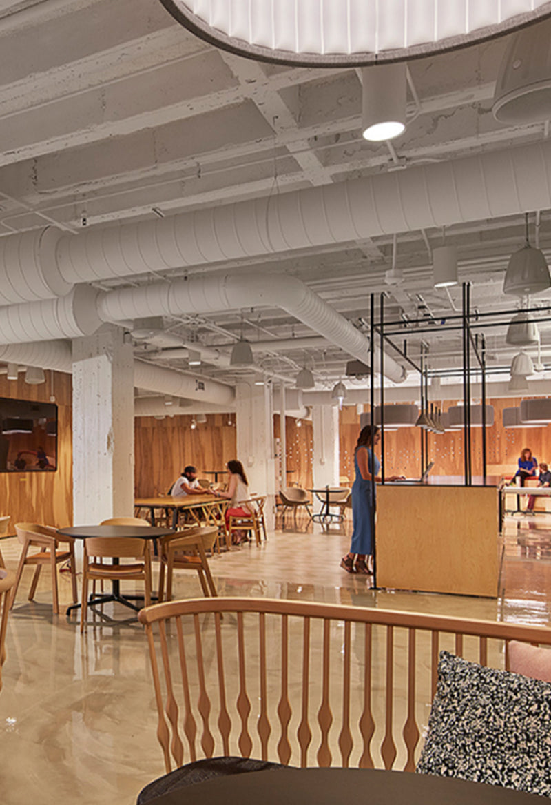 Open-concept workspace with polished concrete floors.